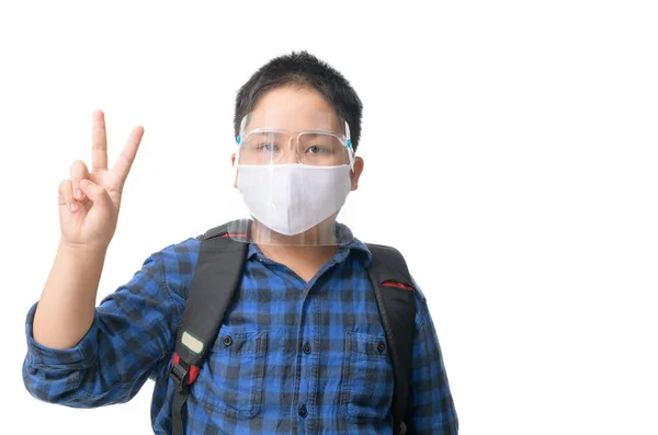 Ασιάτης Μαθητής Αγόρι Φορούν Ασπίδα Προσώπου Και Μάσκα Κατά Μολυσματικών — Φωτογραφία Αρχείου
