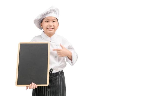 Happy Asian Girl Chef Uniform Pointing Blank Blackboard Isolated White — Stock Photo, Image