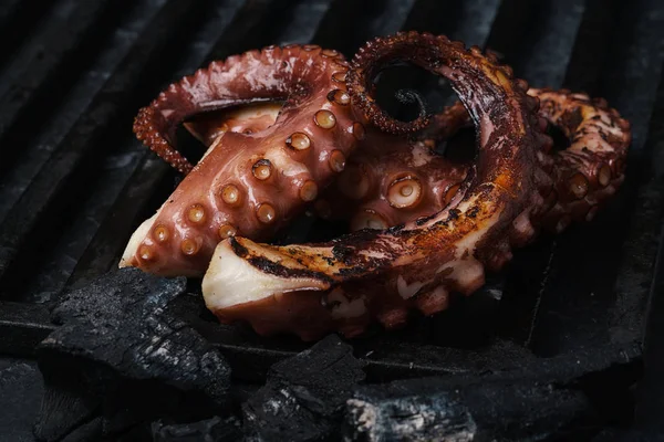 stock image grilled octopus on the grill close up