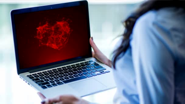 Girl Holding Laptop Heart Image — Stock Video