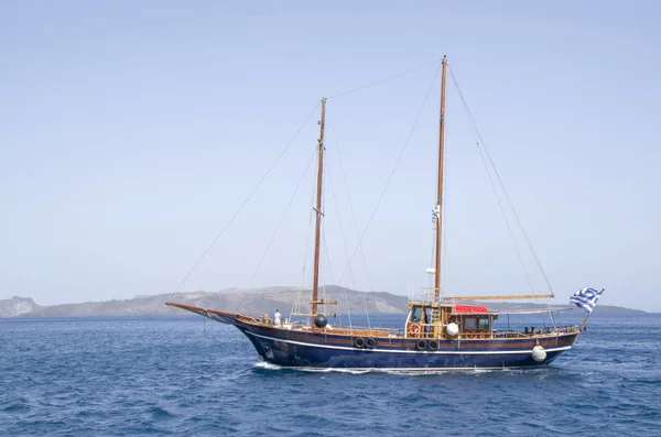 Wooden ship for trip near Santorini island, Greec