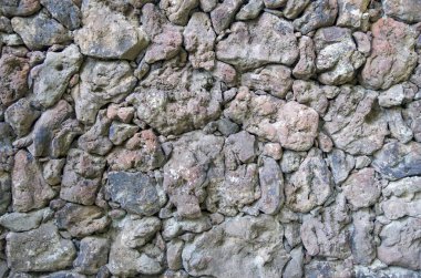 Kabartma renkli volkanik taş closeu duvarına