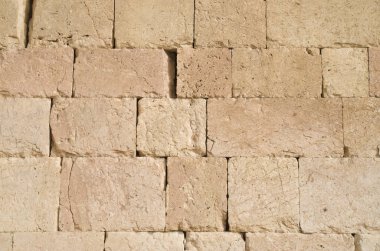 Eski kabartma sarı kireçtaşı duvar closeu