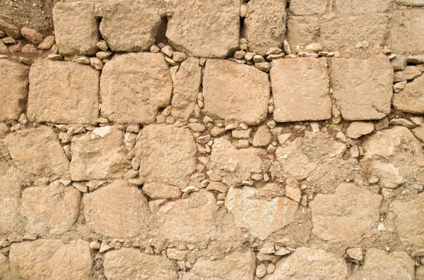 Eski kabartma sarı kireçtaşı duvar closeu