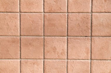 Bir duvar ile kahverengi kare Seramik kaplı