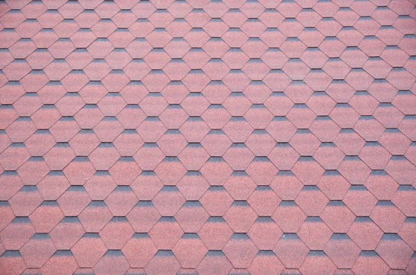 New modern bitumen red shingle roof close up — Stock Photo, Image