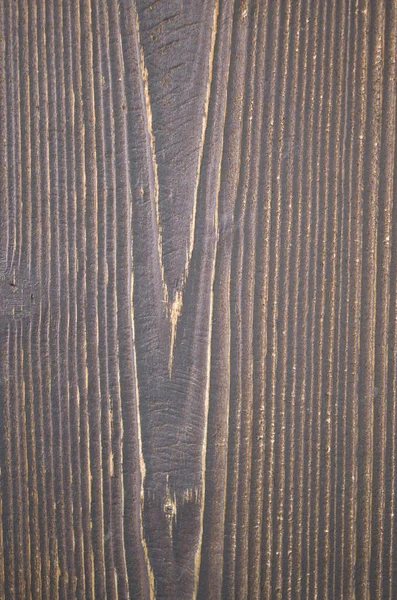 Oude houten plank op de muur closeup — Stockfoto