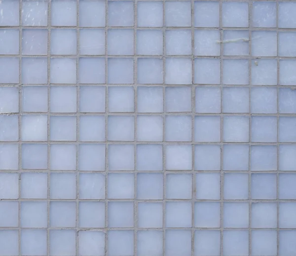 Quadrato lastre di vetro grigio rivestimento sulla parete — Foto Stock