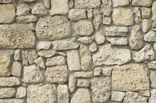 Alte Relief-Kalksteinmauer Nahaufnahme — Stockfoto