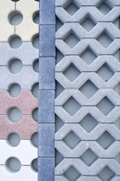 Vari colori e forme di blocchi di cemento in negozio — Foto Stock