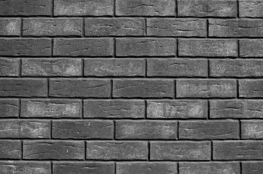 Yeni gri dekoratif tuğla duvar.