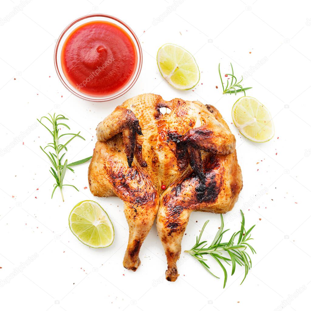 Butterflied grilled whole chicken served with limes and rosemary isolated on white background