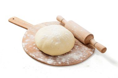 Fresh raw dough for pizza or bread baking on wooden cutting board isolated on white background.  clipart