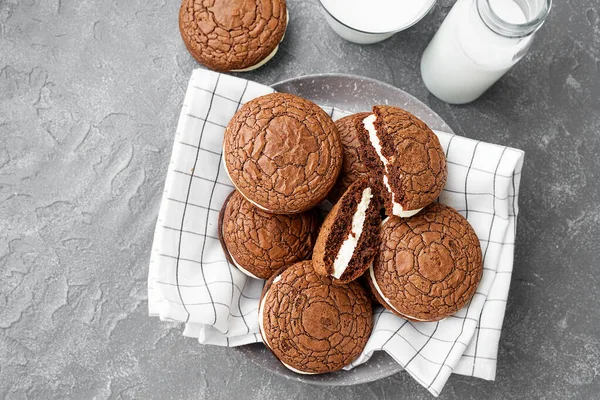 Chocolate brownie - sandwich cookies with cream cheese filling . top view