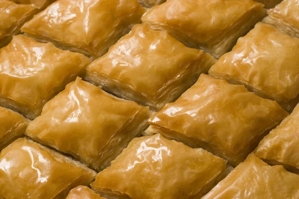 Pieces of Turkish or arabic traditional declious oriental dessert pahlava, baklava. — Stock Photo, Image