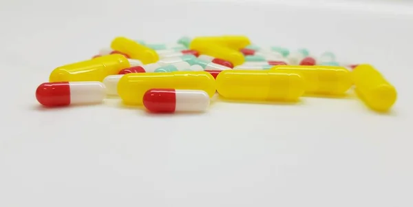 Capsules of different sizes and colors — Stock Photo, Image