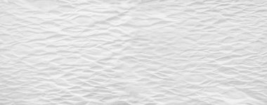 Arkaplanı buruşuk kağıtlarla kaplanmış..