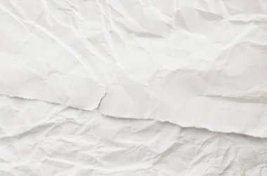 Arkaplanı buruşuk kağıtlarla kaplanmış..