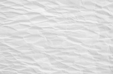 Arkaplanı buruşuk kağıtlarla kaplanmış..