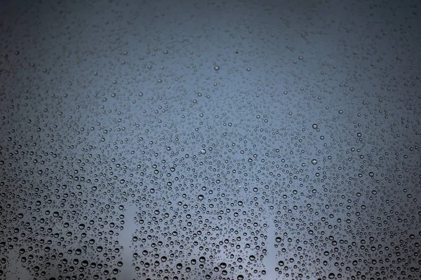 Foto Gotas Lluvia Cristal Ventana Con Cielo Nublado Como Fondo —  Fotos de Stock