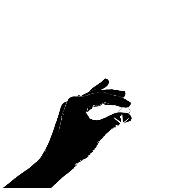 Female hand holding a piece of glass through which the sun shines. Black and white — Stock Photo, Image