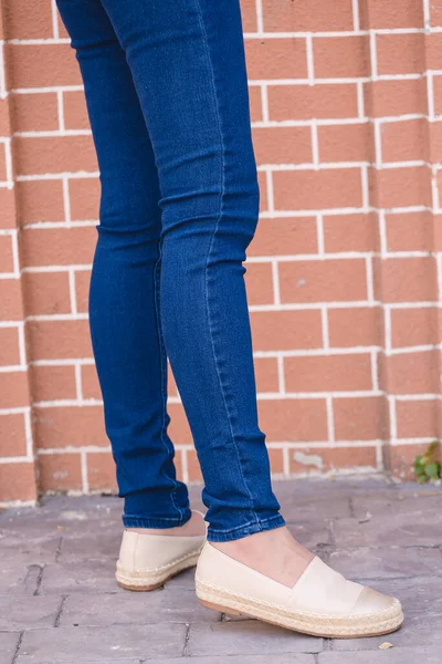 Happy Asia woman in navy blue skinny jeans, dark blue jeans