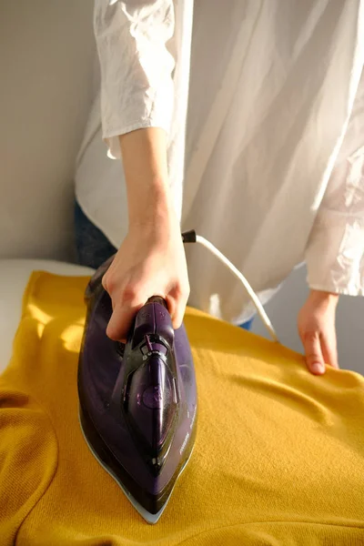 Girl Ironing Clothes Home Yellow Jacket — Stock Photo, Image