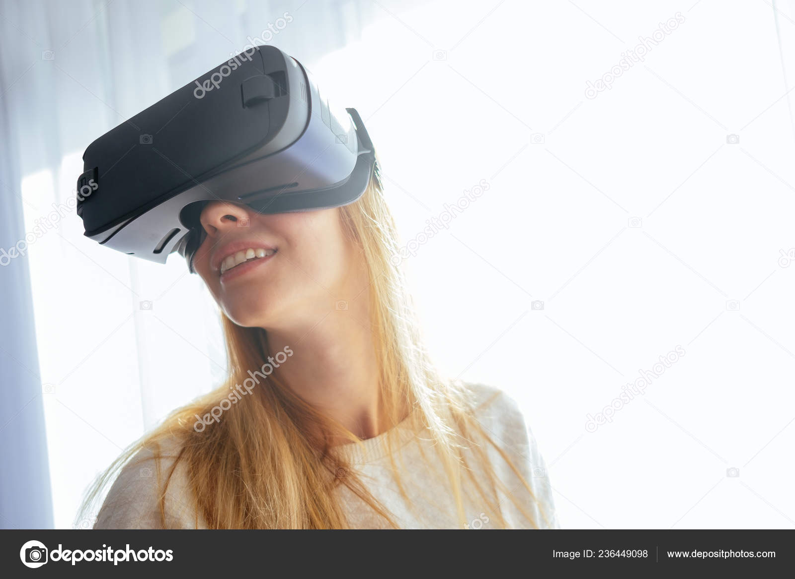 Young Blonde Home Modern Design Puts Virtual Reality Glasses