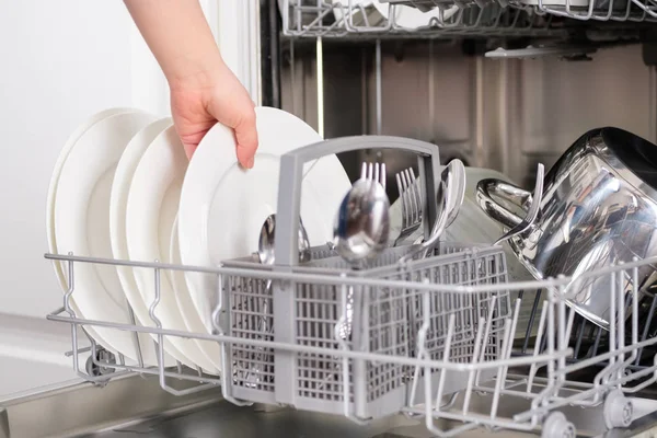 Girl Collects Disassembled Dishwasher — Stock Photo, Image