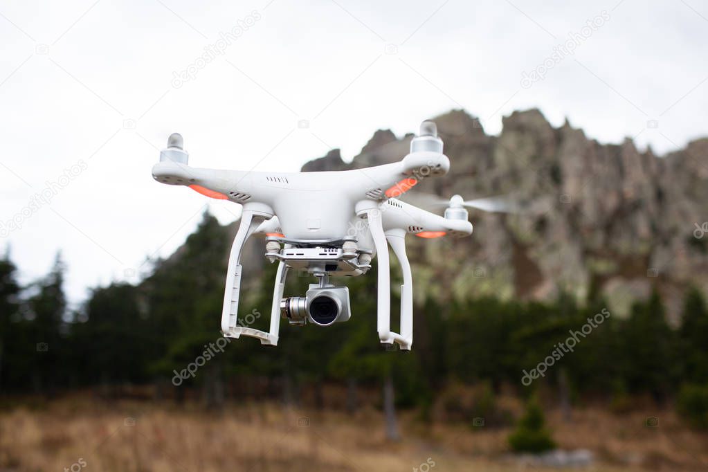 Quadcopter drone outdoors in the sky
