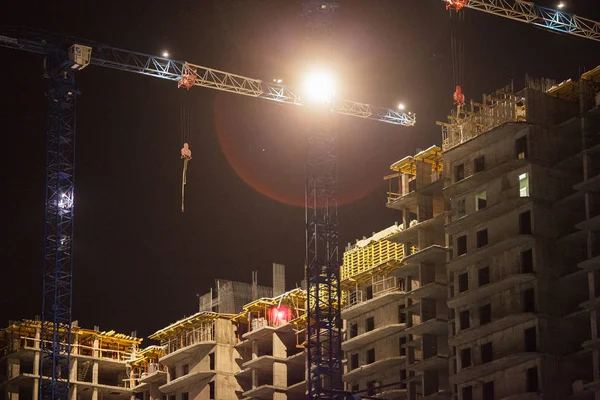 Urban construction of residential buildings in the night metropolis