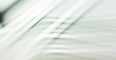 Soyut, enerjik bir arkaplan. Renkli, dalgalı duvar kâğıdı. Grafik çizimi. Üst üste gelen yumuşak dalgalı çizgiler.