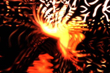 Işık parçacık izleri. Parlayan parçacıkları ve çizgileri olan ışık patlaması yıldızı. Güzel hareketli soyut ışın arkaplanı.