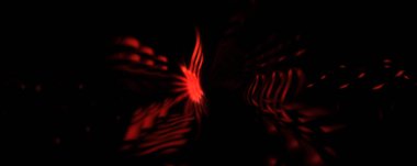 Işık parçacık izleri. Parlayan parçacıkları ve çizgileri olan ışık patlaması yıldızı. Güzel hareketli soyut ışın arkaplanı.