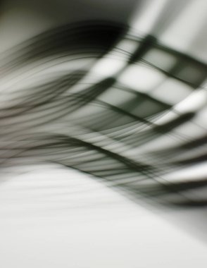 Soyut, enerjik bir arkaplan. Renkli, dalgalı duvar kâğıdı. Grafik çizimi. Üst üste gelen yumuşak dalgalı çizgiler.