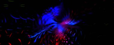 Işık parçacık izleri. Parlayan parçacıkları ve çizgileri olan ışık patlaması yıldızı. Güzel hareketli soyut ışın arkaplanı.