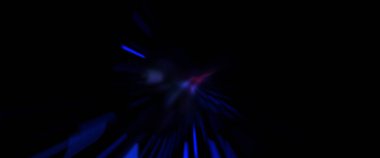 Işık parçacık izleri. Parlayan parçacıkları ve çizgileri olan ışık patlaması yıldızı. Güzel hareketli soyut ışın arkaplanı.