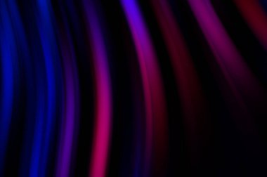 Siyah arka planda renkli düz çizgiler. Sıvı ve sıvı renkli dalgalar karanlıkta akıyor. Duvar kağıdı, afiş, arkaplan, kart, kitap, kapak, poster, afiş, broşür