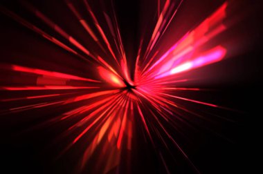 Fütürist mercek patlaması. Parlayan parçacıkları ve çizgileri olan ışık patlaması yıldızı. Güzel soyut ışın arkaplanı.