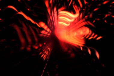 Işık parçacık izleri. Parlayan parçacıkları ve çizgileri olan ışık patlaması yıldızı. Güzel hareketli soyut ışın arkaplanı.