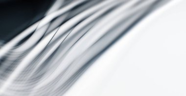 Soyut, enerjik bir arkaplan. Renkli, dalgalı duvar kâğıdı. Grafik çizimi. Üst üste gelen yumuşak dalgalı çizgiler.