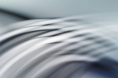 Soyut, enerjik bir arkaplan. Renkli, dalgalı duvar kâğıdı. Grafik çizimi. Üst üste gelen yumuşak dalgalı çizgiler.