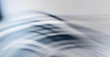 Soyut, enerjik bir arkaplan. Renkli, dalgalı duvar kâğıdı. Grafik çizimi. Üst üste gelen yumuşak dalgalı çizgiler.