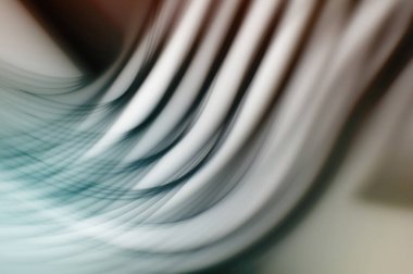 Soyut, enerjik bir arkaplan. Renkli, dalgalı duvar kâğıdı. Grafik çizimi. Üst üste gelen yumuşak dalgalı çizgiler.