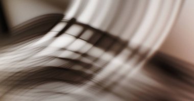 Soyut, enerjik bir arkaplan. Renkli, dalgalı duvar kâğıdı. Grafik çizimi. Üst üste gelen yumuşak dalgalı çizgiler.