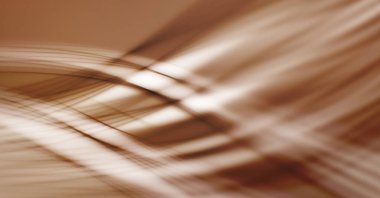 Soyut, enerjik bir arkaplan. Renkli, dalgalı duvar kâğıdı. Grafik çizimi. Üst üste gelen yumuşak dalgalı çizgiler.