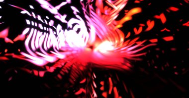 Işık parçacık izleri. Parlayan parçacıkları ve çizgileri olan ışık patlaması yıldızı. Güzel hareketli soyut ışın arkaplanı.