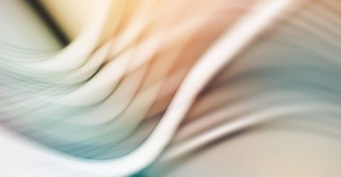 Soyut, enerjik bir arkaplan. Renkli, dalgalı duvar kâğıdı. Grafik çizimi. Üst üste gelen yumuşak dalgalı çizgiler.