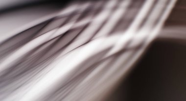 Soyut, enerjik bir arkaplan. Renkli, dalgalı duvar kâğıdı. Grafik çizimi. Üst üste gelen yumuşak dalgalı çizgiler.