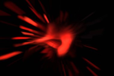 Işık parçacık izleri. Parlayan parçacıkları ve çizgileri olan ışık patlaması yıldızı. Güzel hareketli soyut ışın arkaplanı.